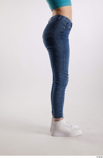 Rada  1 blue jeans casual dressed flexing leg side…